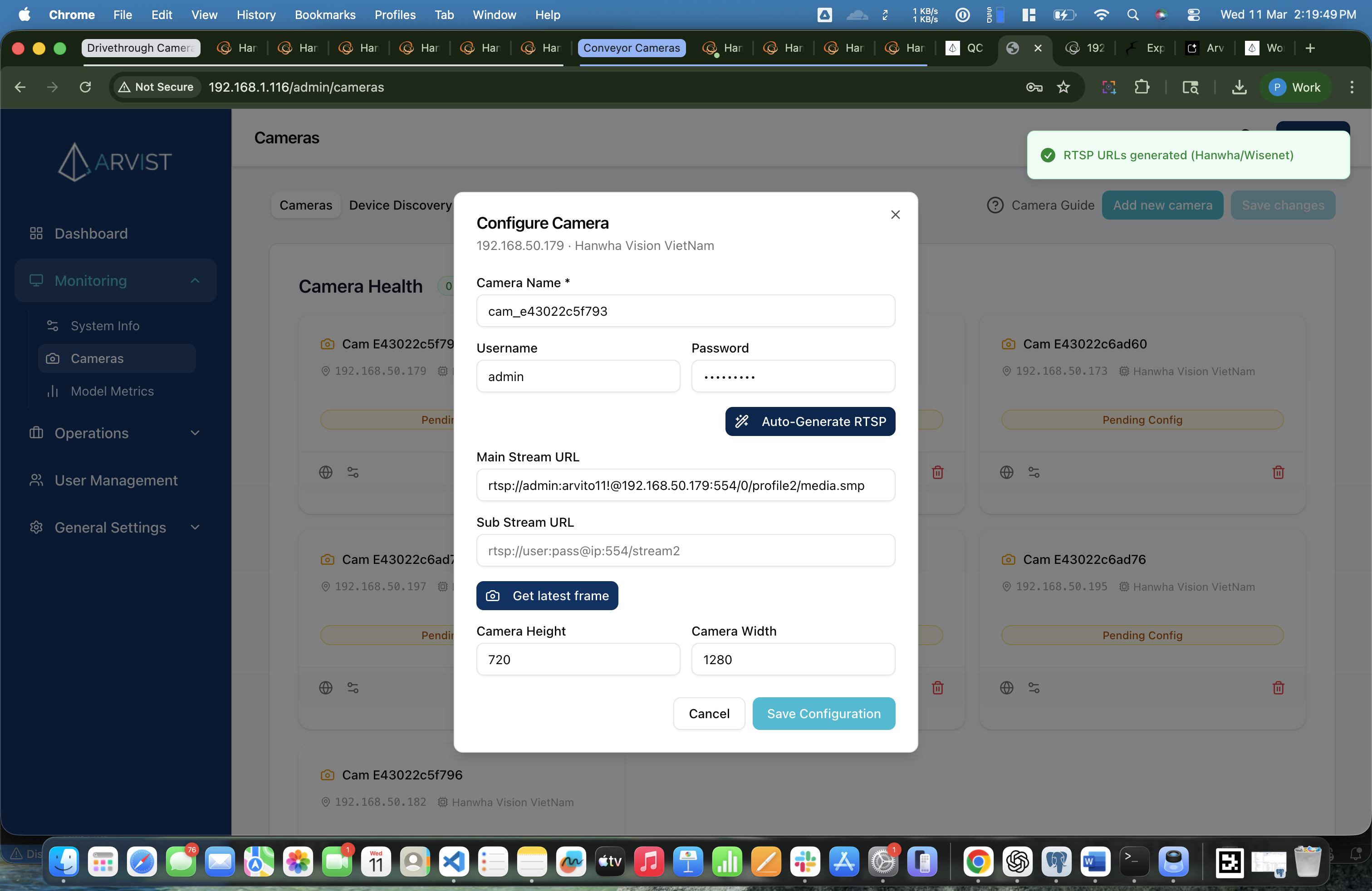 Configure Camera dialog after clicking Auto-Generate RTSP showing the Main Stream URL auto-filled and the "RTSP URLs generated (Hanwha/Wisenet)" success toast
