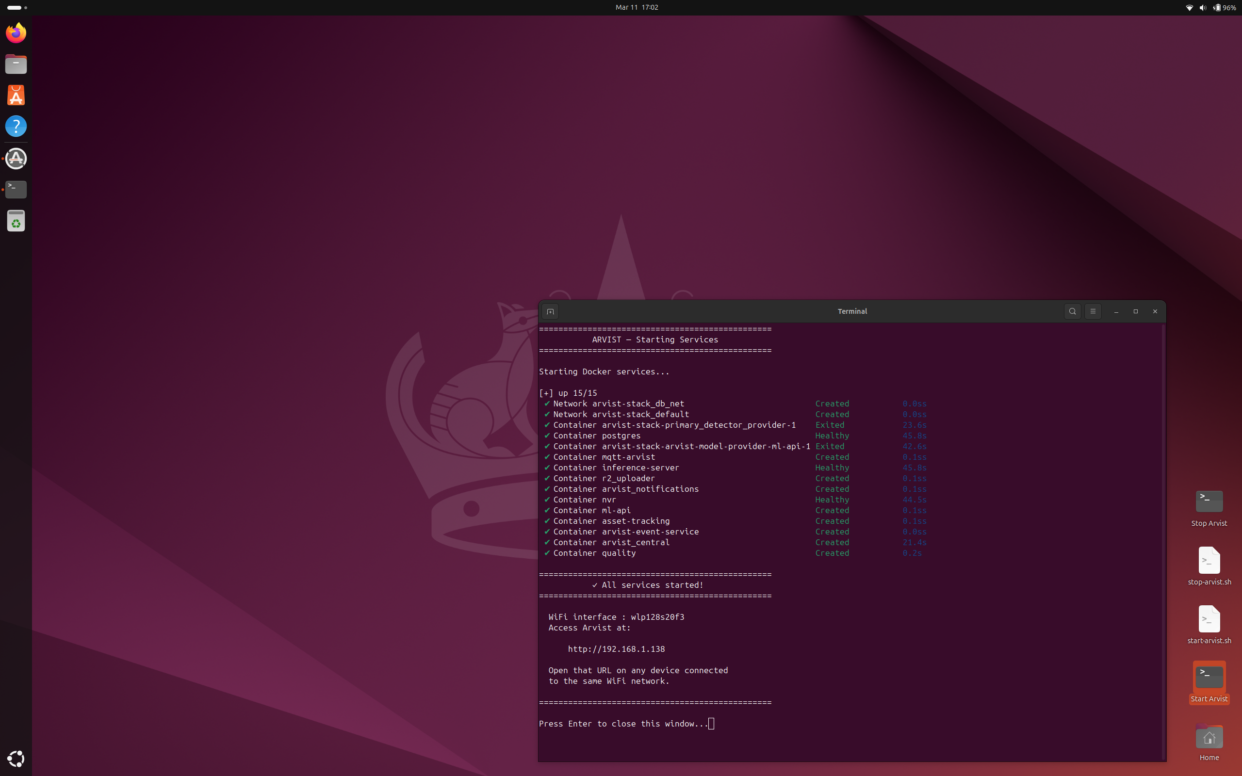 Start Arvist terminal showing all 15 Docker services started with green checkmarks, WiFi interface wlp2s20f3, and access URL http://192.168.1.138